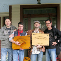 Talking Board Collectors Bob Murch, Mike Buchner, Brandon Hodge, and Andrew Vespia, at the birthplace of the ouija -the former home of Charles Kennard, Chestertown, Maryland. Talking Board Collectors Bob Murch, Mike Buchner, Brandon Hodge, and Andrew Vespia, at the former home of Charles Kennard, Chestertown, Maryland.